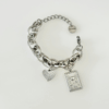 Ασημί ατσάλινο βραχιόλι με charms